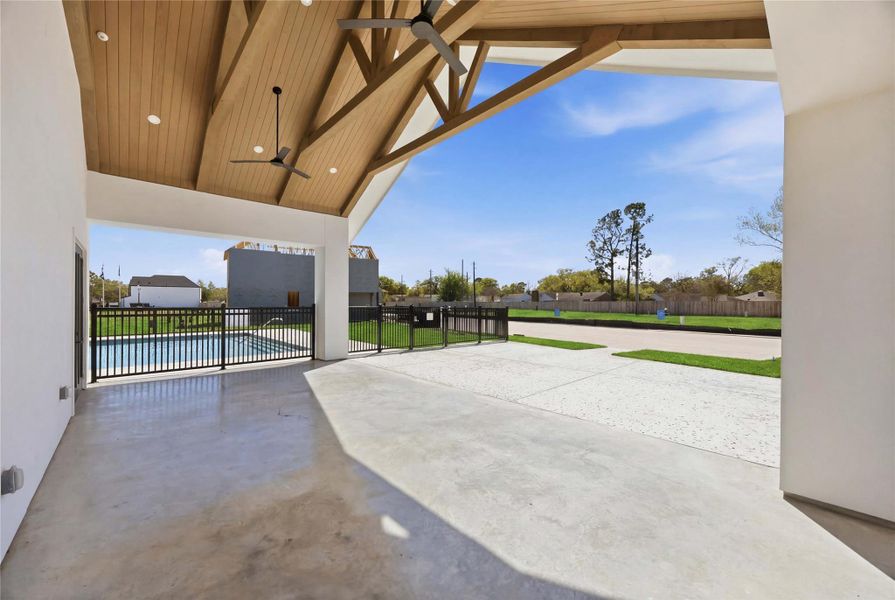 Exterior details and patio area of a home in Alaia Crossing, Houston (Image 23).