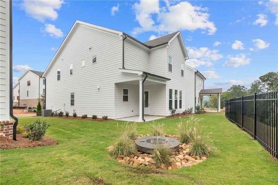 Exterior details and patio area of a home in Palisades Single Family, Cumming (Image 2). Exterior details and patio area of a home in Palisades Single Family, Cumming (Image 2).