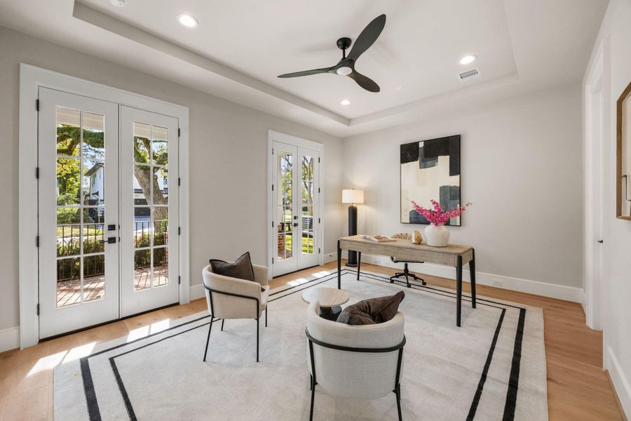 Home Study features 2 sets of French Doors leading to the front patio.