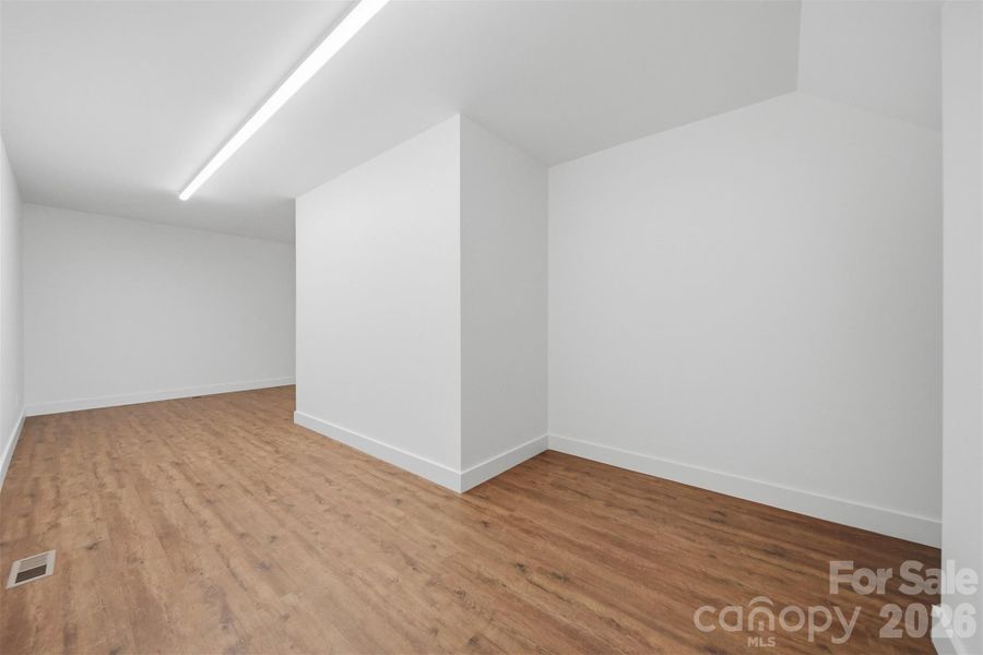 Spacious, unfurnished interior of a new home in , Lenoir (Image 39).