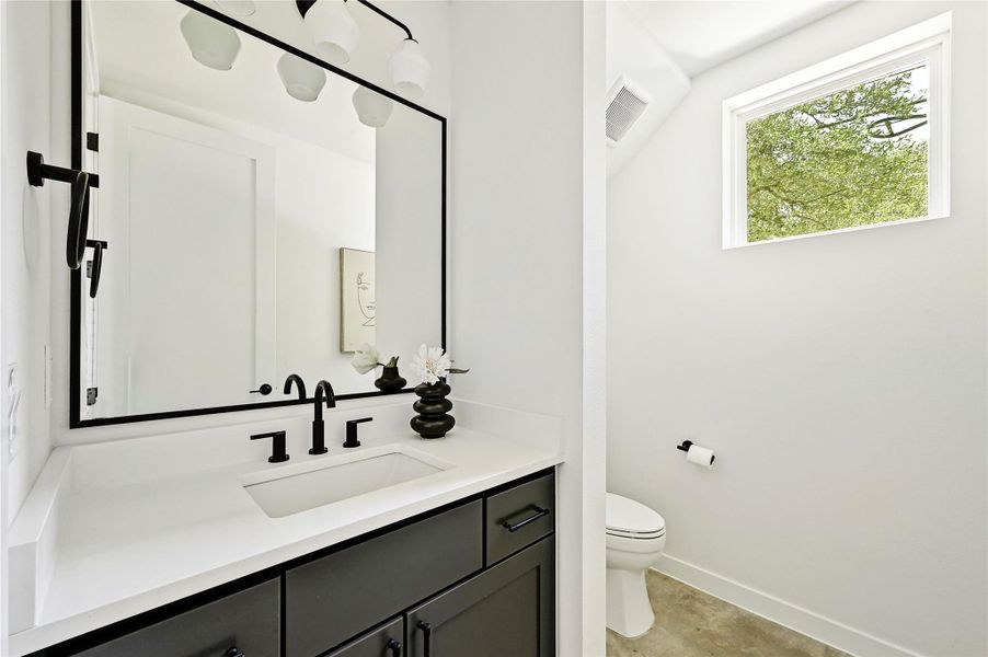 Main floor powder bath. Main floor powder bath.