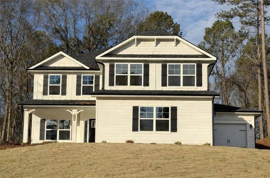 Front exterior of a new home in The Fields of Walnut Creek, Pendergrass, GA, highlighting curb appeal (Image 12).
