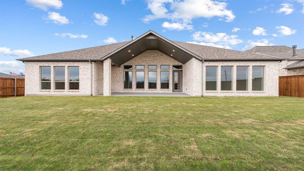 Exterior details and patio area of a home in Terraces 72', Rockwall (Image 3).