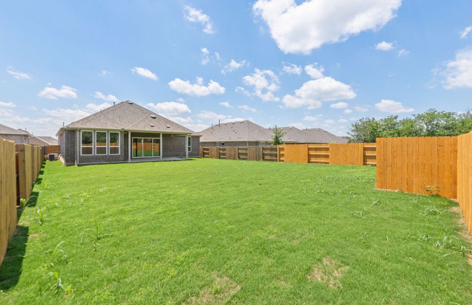 Exterior details and patio area of a home in 6 Creeks, Kyle (Image 28).