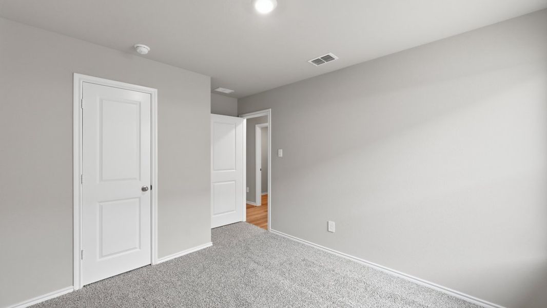 Representative unfurnished interior of a home built from the Dalton by D.R. Horton in Hickory Grove, Krum (Image 34).