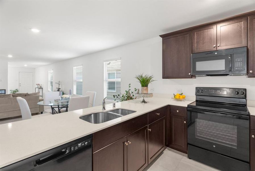 Kitchen looking on to Dining and Living Areas