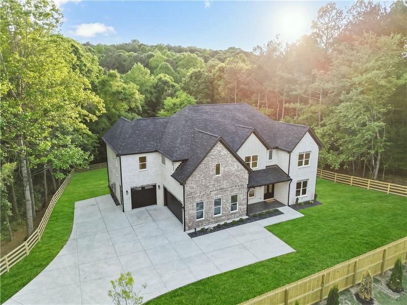 Front exterior of a new home in , Dacula, GA, highlighting curb appeal (Image 28).