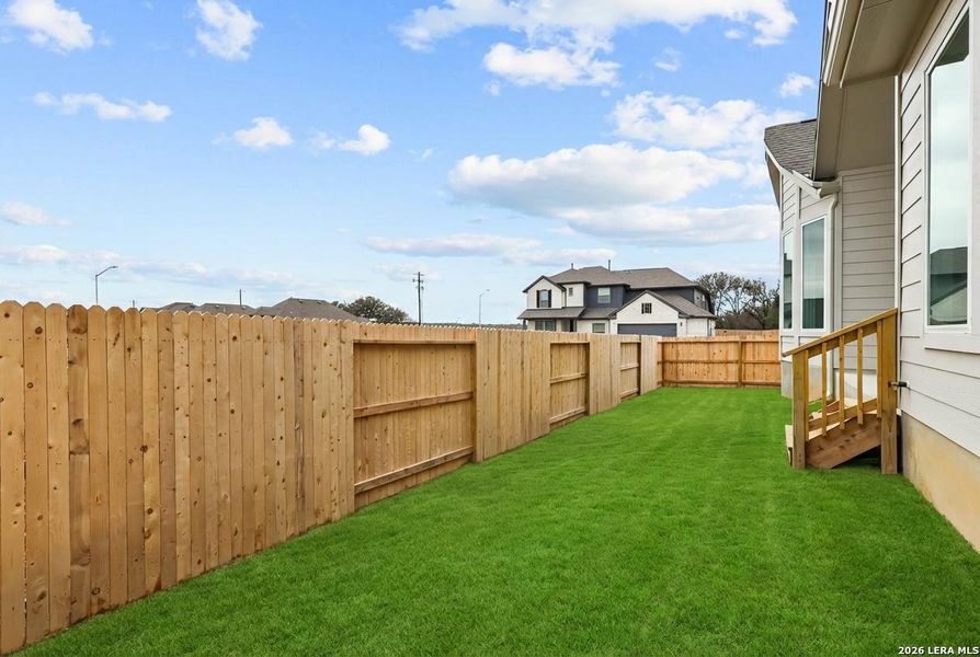Exterior details and patio area of a home in Buffalo Crossing, Cibolo (Image 20).
