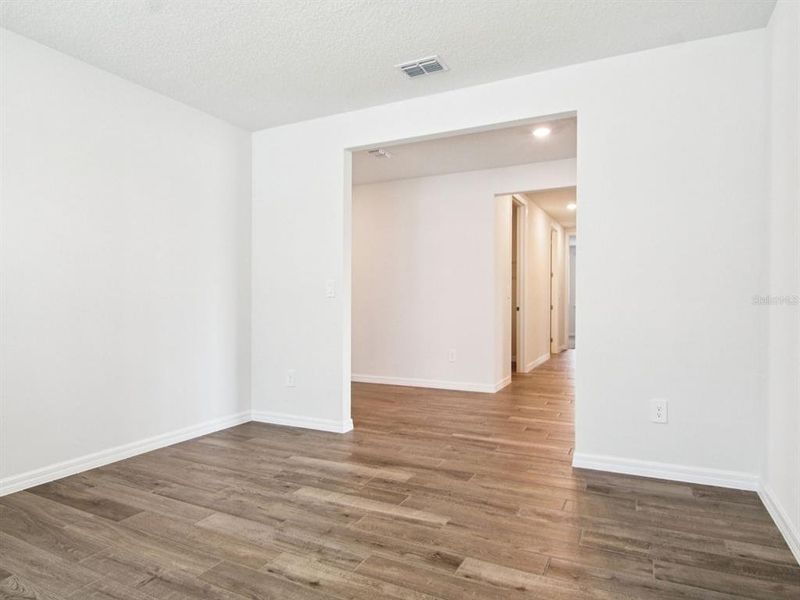 Spacious, unfurnished interior of a new home in Oakfield Trails - Signature Series, Parrish (Image 9).