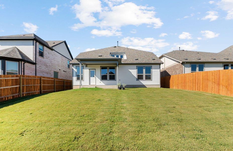 Exterior details and patio area of a home in Saddleback at Santa Rita Ranch, Liberty Hill (Image 20). Exterior details and patio area of a home in Saddleback at Santa Rita Ranch, Liberty Hill (Image 20).