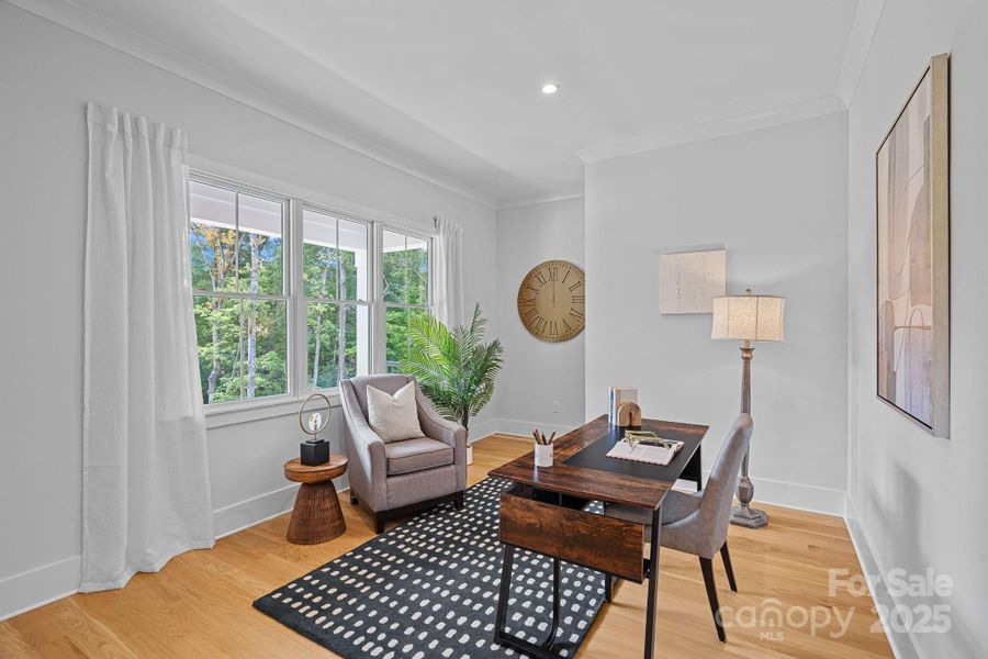 Office on main floor overlooking the sprawling front yard.