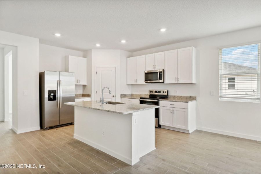Furnished interior view inside a new home in Cypress Meadows - Signature Series, Jacksonville (Image 7).