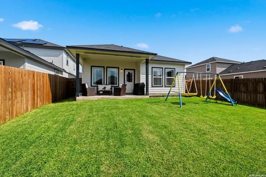 Exterior details and patio area of a home in Willow View, Converse (Image 3).
