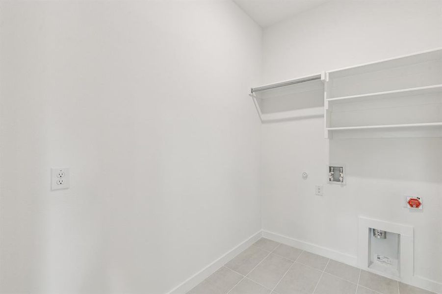 Utility Room in the Da Vinci II home plan by Trophy Signature Homes – REPRESENTATIVE PHOTO