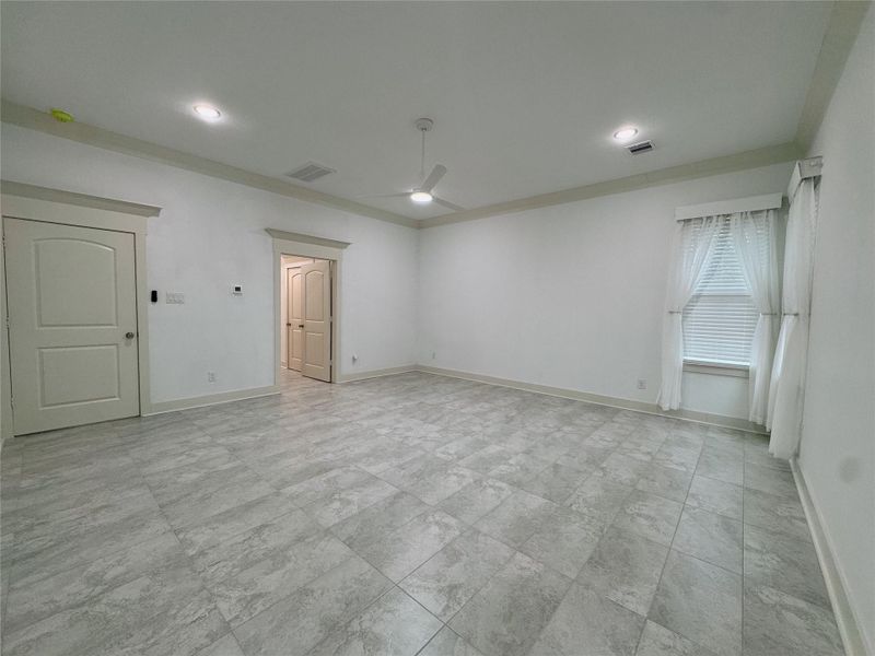 Primary bedroom overlooks the backyard
