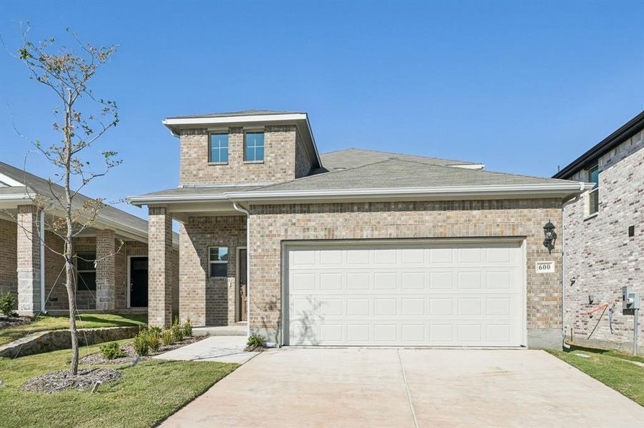 Front exterior of a new home in Simpson Crossing - Spring Series, McKinney, TX, highlighting curb appeal (Image 23).