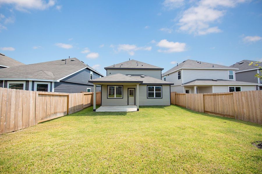 Front exterior of a new home in Cliffstone Hills, Conroe, TX, highlighting curb appeal (Image 2). Front exterior of a new home in Cliffstone Hills, Conroe, TX, highlighting curb appeal (Image 2).