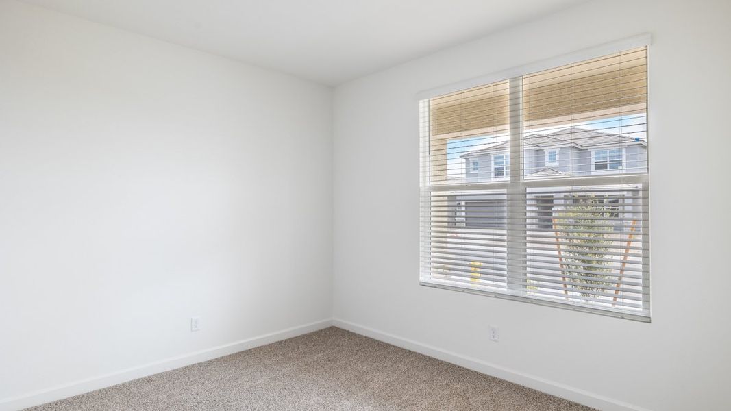 Spacious, unfurnished interior of a new home in Zanjero Pass, Waddell (Image 9).
