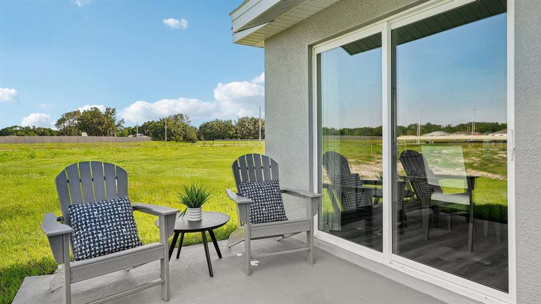 Exterior details and patio area of a home in Sunset Hills, Summerfield (Image 2).