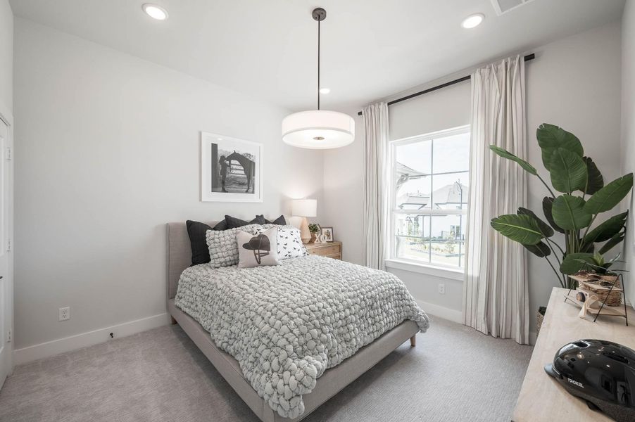Furnished interior view inside a new home in Bridgeland, Cypress (Image 21).