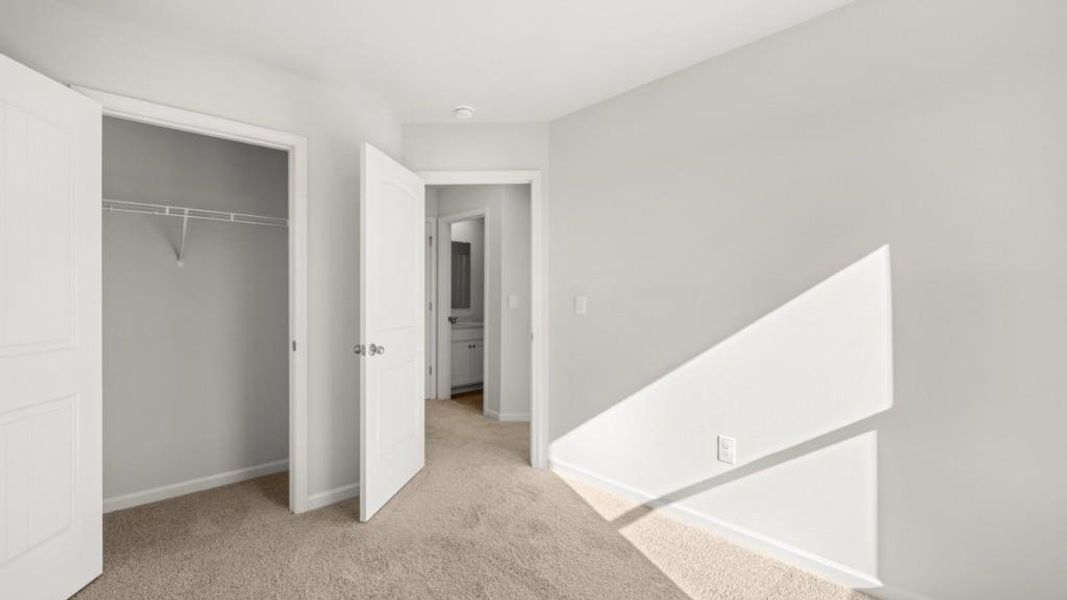 Spacious, unfurnished interior of a new home in Waypoint, Flowery Branch (Image 24).