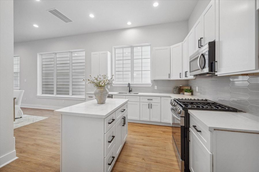 Whether you're hosting a gathering or cooking for one, there's ample room to move around this kitchen!