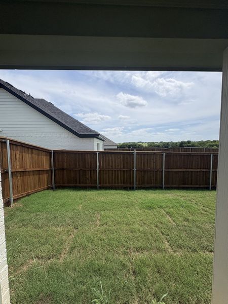 Exterior details and patio area of a home in Stillwater Lake Estates, Godley (Image 3).