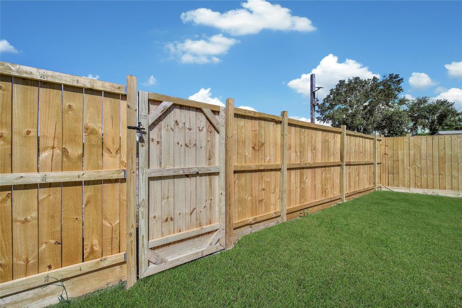 Exterior details and patio area of a home in , Houston (Image 2). Exterior details and patio area of a home in , Houston (Image 2).