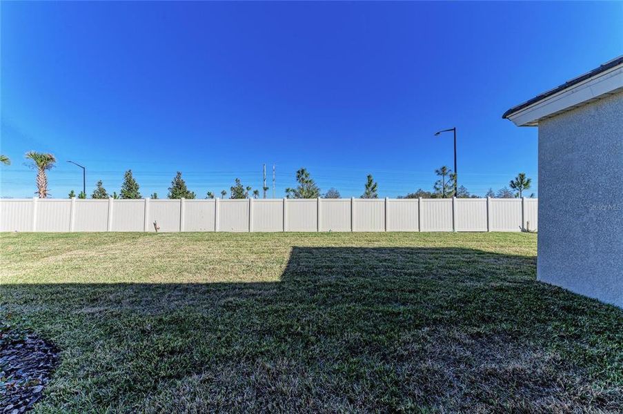 Exterior details and patio area of a home in Oakfield, Parrish (Image 22).