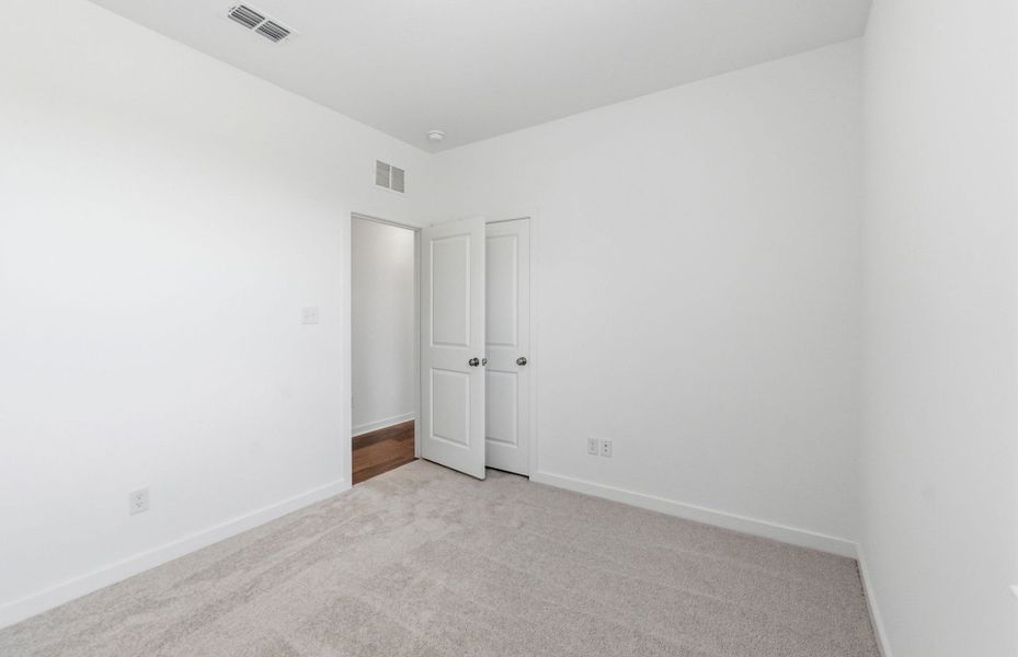 Spacious, unfurnished interior of a new home in Crosswinds, Kyle (Image 32).