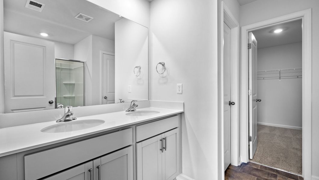 Representative furnished interior of a home built from the Biltmore by D.R. Horton in Woodglen, Piedmont (Image 10).