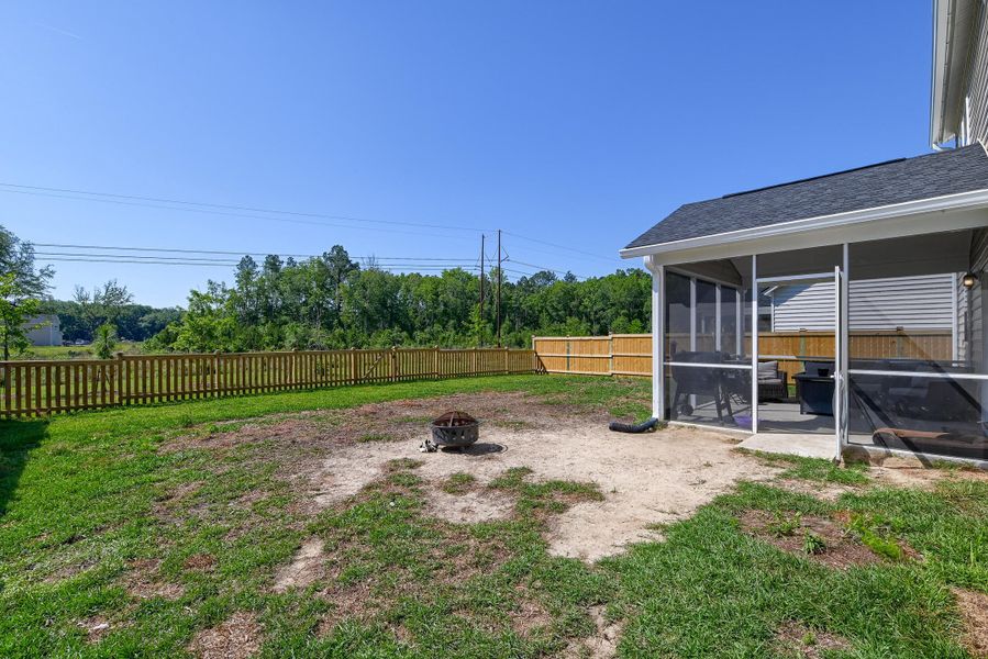 Exterior details and patio area of a home in Heron's Walk at Summers Corner, Summerville (Image 31).