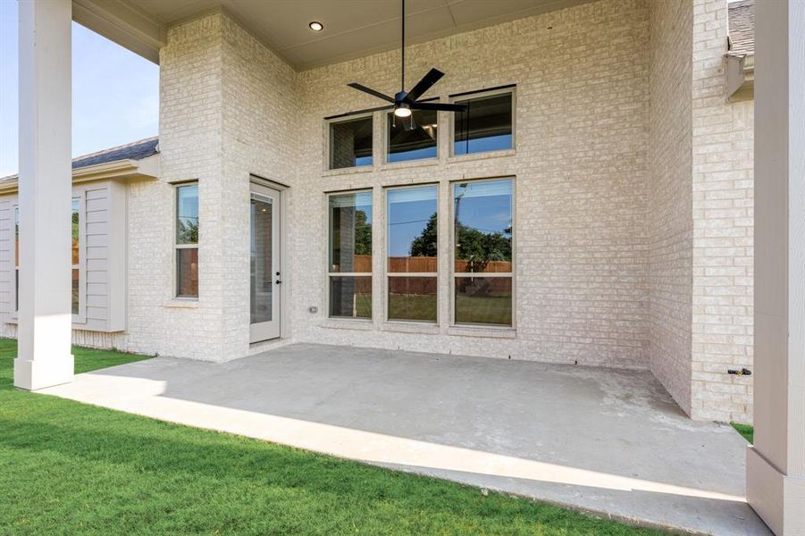 Front exterior of a new home in Rockwood 90, Mansfield, TX, highlighting curb appeal (Image 26). Front exterior of a new home in Rockwood 90, Mansfield, TX, highlighting curb appeal (Image 26).