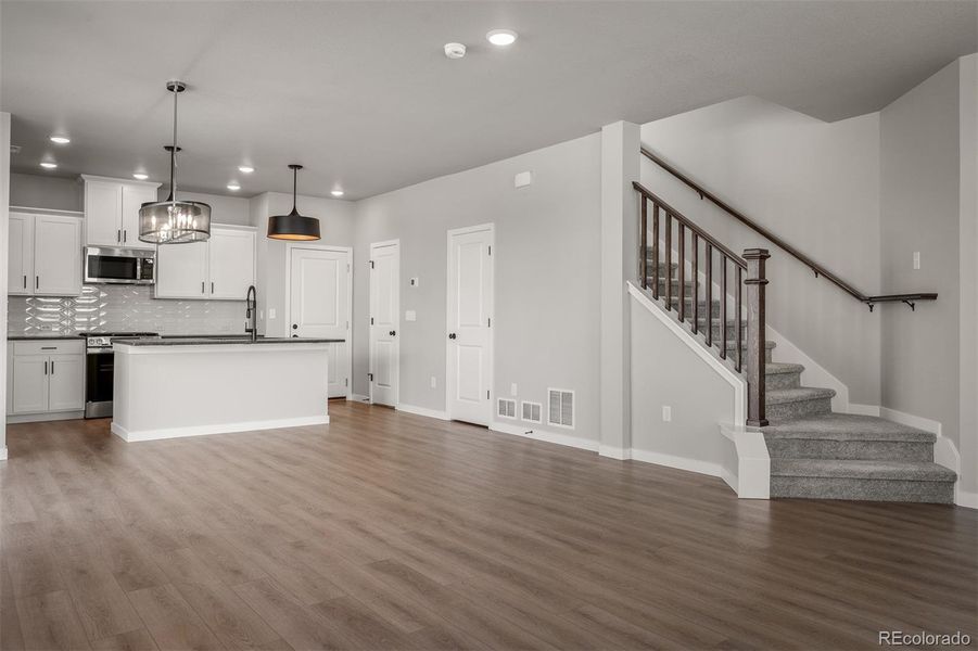 Spacious, unfurnished interior of a new home in Revel Crossing at Wolf Ranch – The Ascent Collection, Colorado Springs (Image 13).