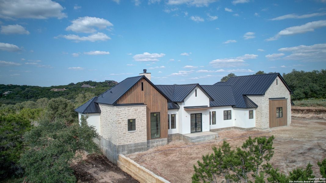 Front exterior of a new home in , New Braunfels, TX, highlighting curb appeal (Image 8). Front exterior of a new home in , New Braunfels, TX, highlighting curb appeal (Image 8).