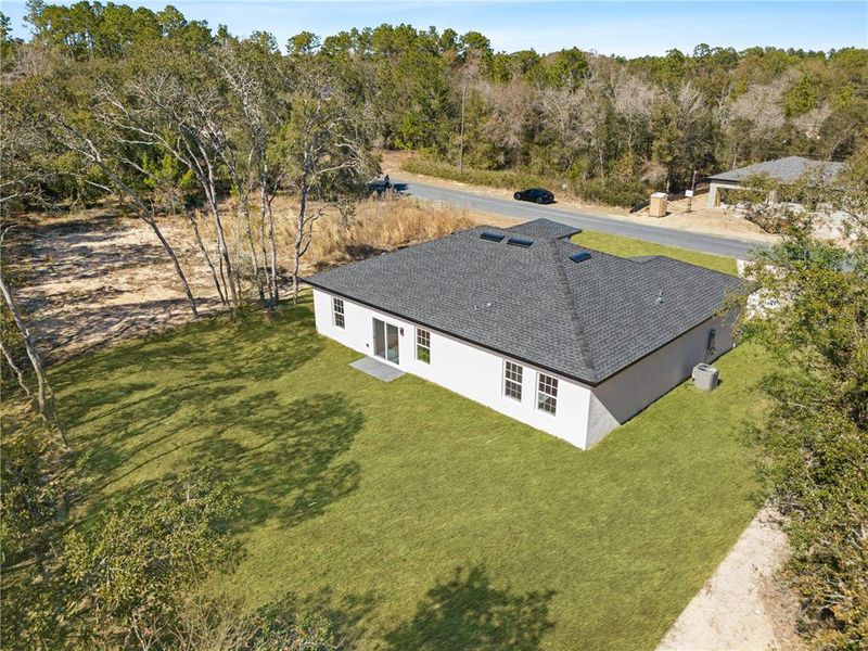 Exterior details and patio area of a home in , Citrus Springs (Image 4).