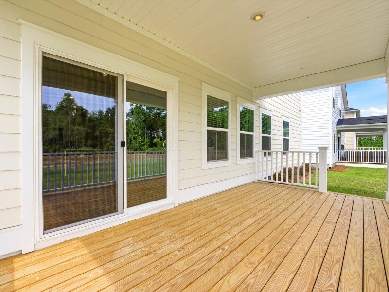 Exterior details and patio area of a home in The Coves at Lakes of Cane Bay, Summerville (Image 3).