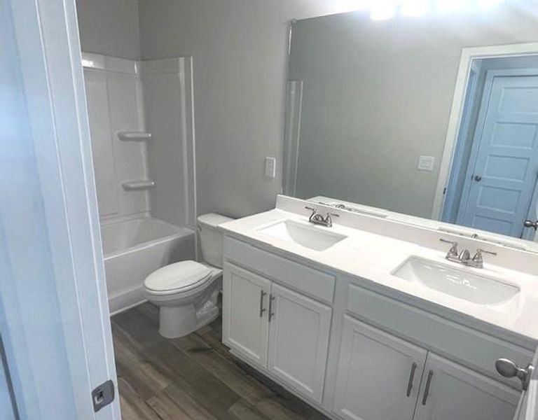 Furnished interior view inside a new home in Ponderosa Farms Estates, Gainesville (Image 10).