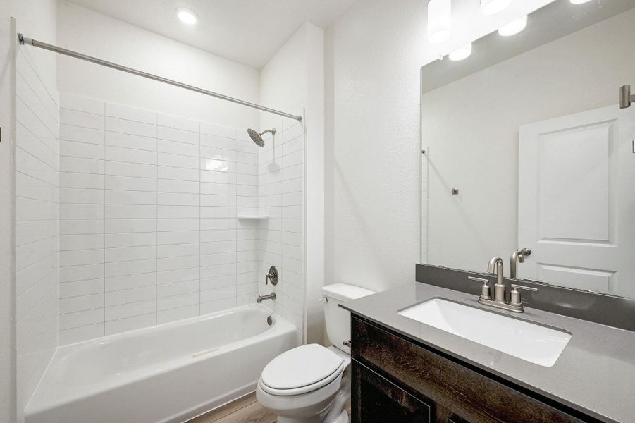 Furnished interior view inside a new home in Salerno - Classic Collection, Round Rock (Image 10). Furnished interior view inside a new home in Salerno - Classic Collection, Round Rock (Image 10).