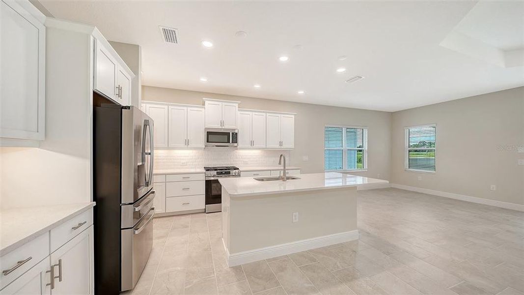 Furnished interior view inside a new home in Grand Park, Sarasota (Image 11).
