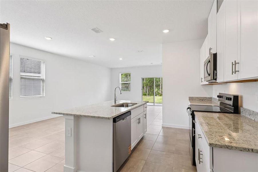Furnished interior view inside a new home in Flagler Village - Classic Series, Palm Coast (Image 12). Furnished interior view inside a new home in Flagler Village - Classic Series, Palm Coast (Image 12).