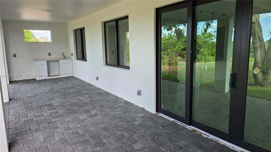 Exterior details and patio area of a home in , Lehigh Acres (Image 4).