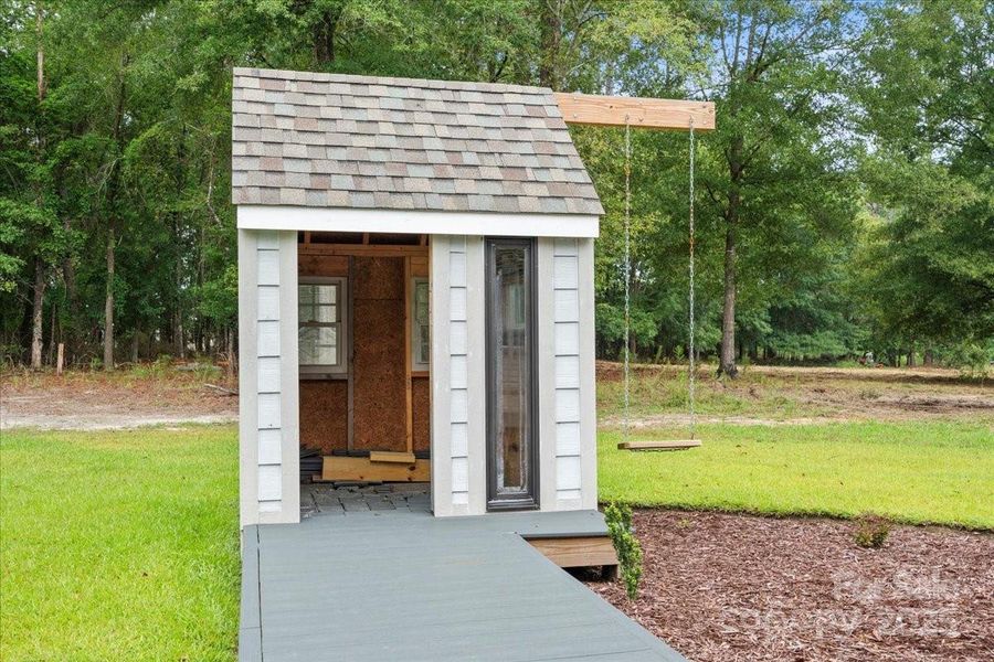 Front exterior of a new home in , Cheraw, SC, highlighting curb appeal (Image 20).