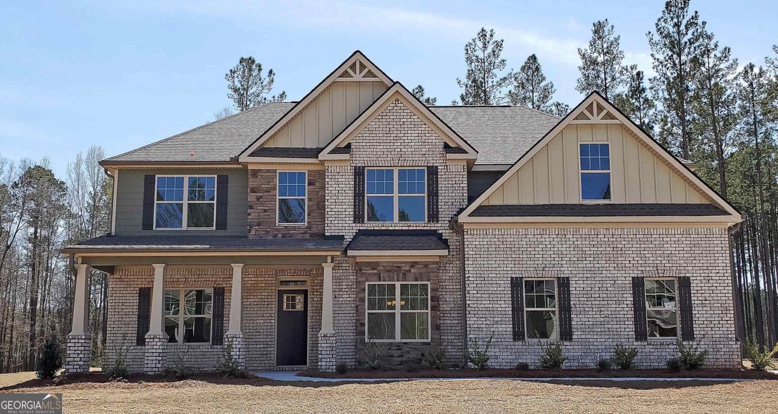 Front exterior of a home in the McIntosh Road community, located in Griffin, GA (Image 1).