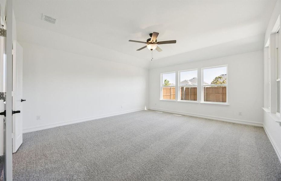 Spacious owner's suite with large windows Spacious owner's suite with large windows