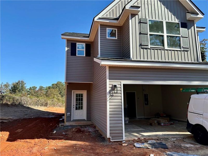 Exterior details and patio area of a home in , Winder (Image 1).