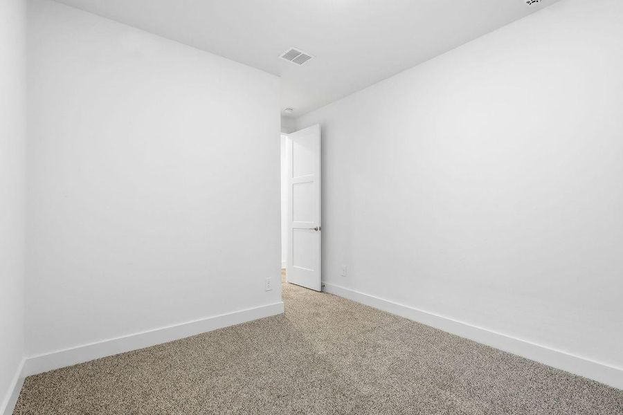 Spacious, unfurnished interior of a new home in Hills of Westlake, Conroe (Image 22).