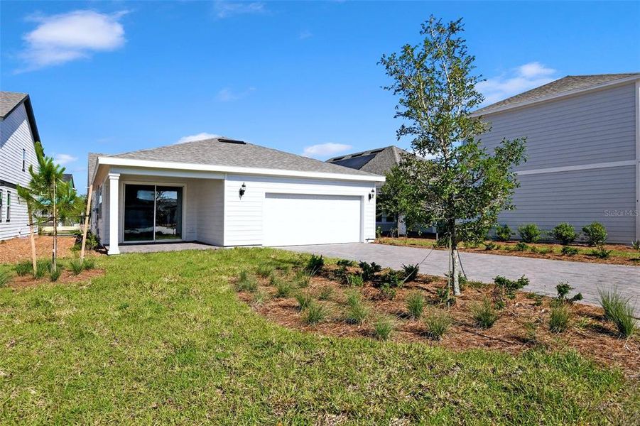 Front exterior of a new home in , St. Cloud, FL, highlighting curb appeal (Image 20).