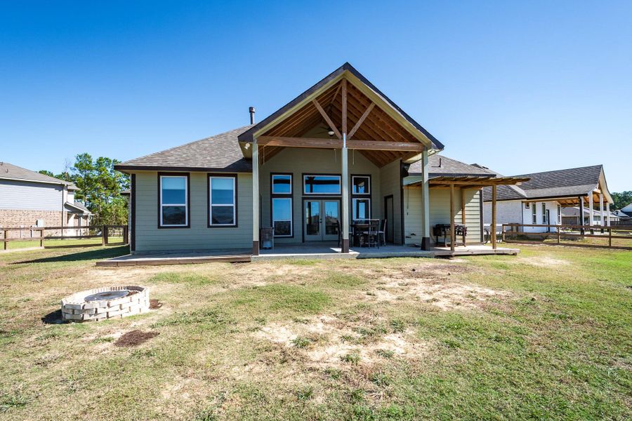 Exterior details and patio area of a home in , Anahuac (Image 3).