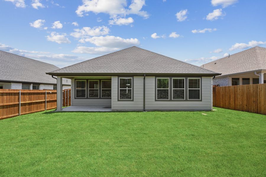 Covered Patio in the Quartz home plan by Trophy Signature Homes – REPRESENTATIVE PHOTO Covered Patio in the Quartz home plan by Trophy Signature Homes – REPRESENTATIVE PHOTO